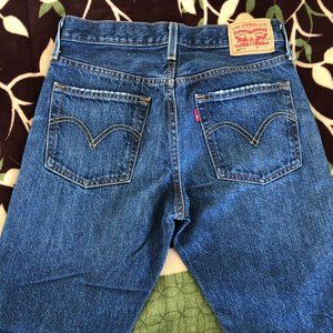 Levi's 501 Tapered Distressed Jeans